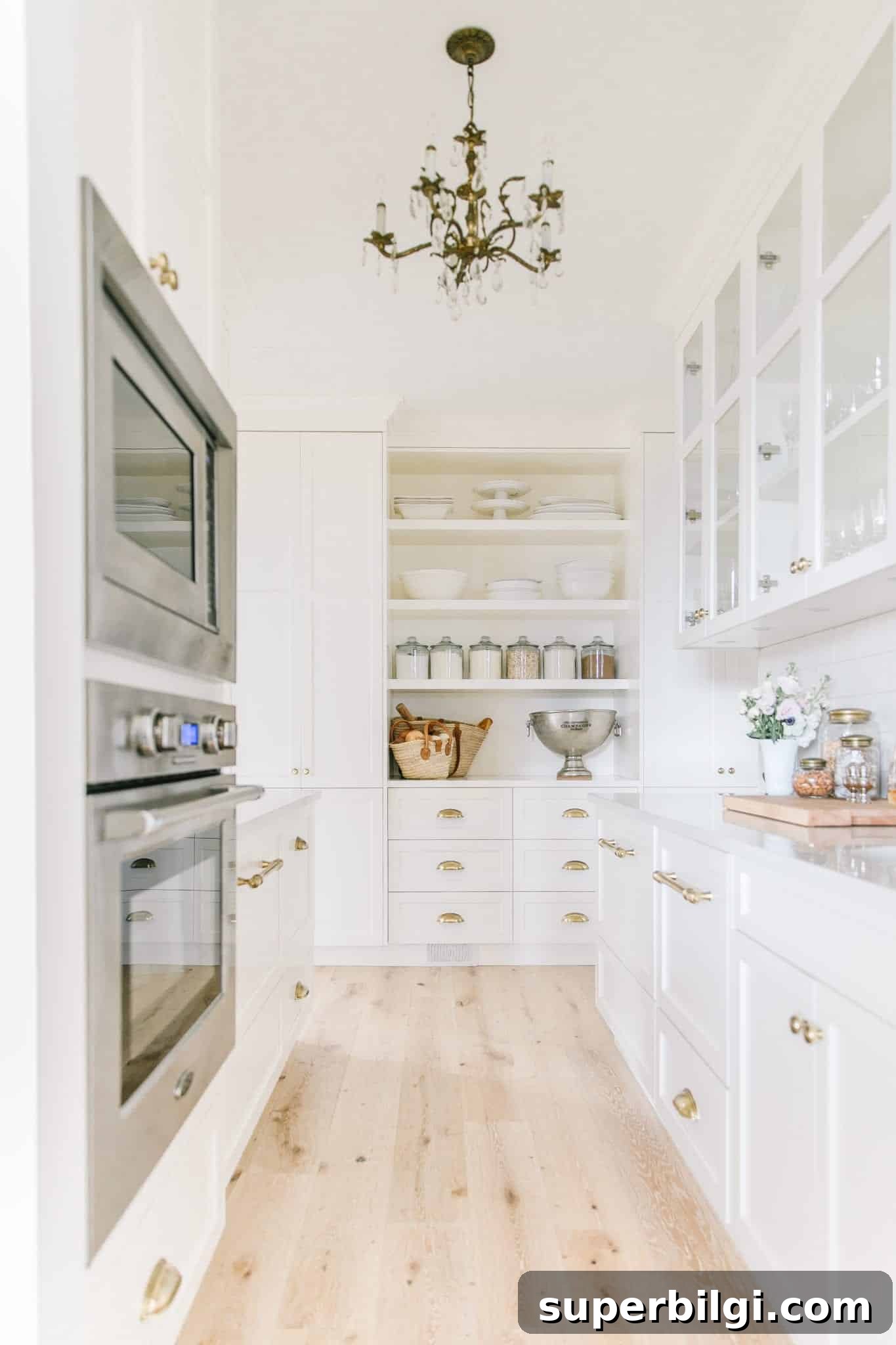 10+ Butler's Pantry Ideas for Stylish, Functional Spaces 14 A white scullery combines open shelving and two spacious counters for tasks.