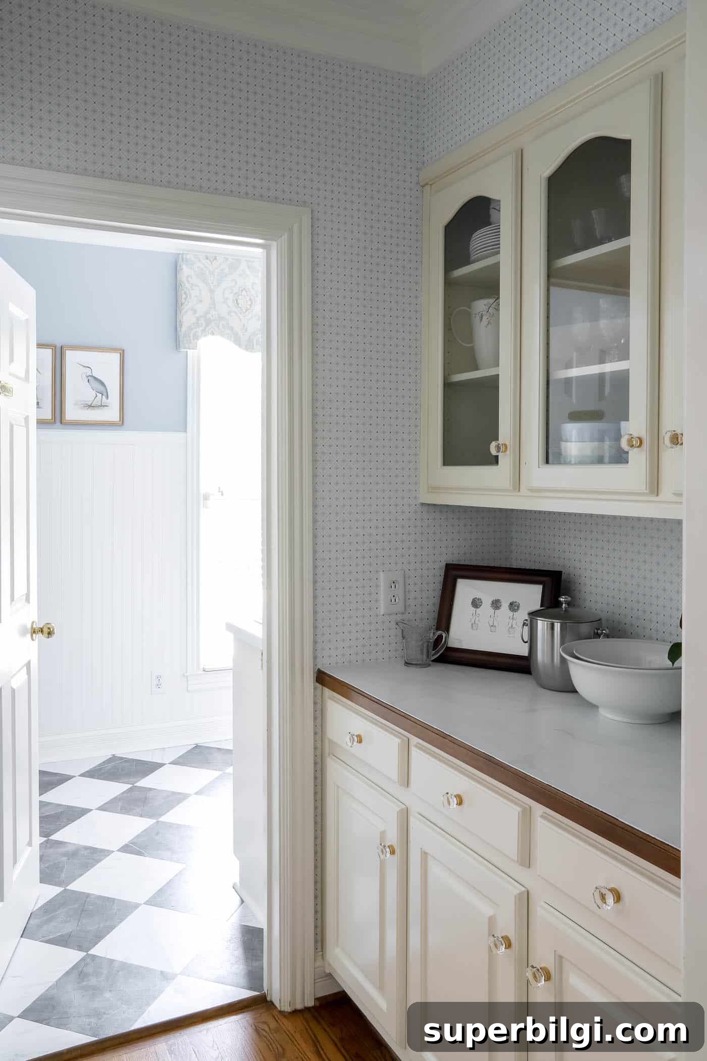 10+ Butler's Pantry Ideas for Stylish, Functional Spaces 8 butler's pantry with blue and white wallpaper walking into a blue and white laundry room.