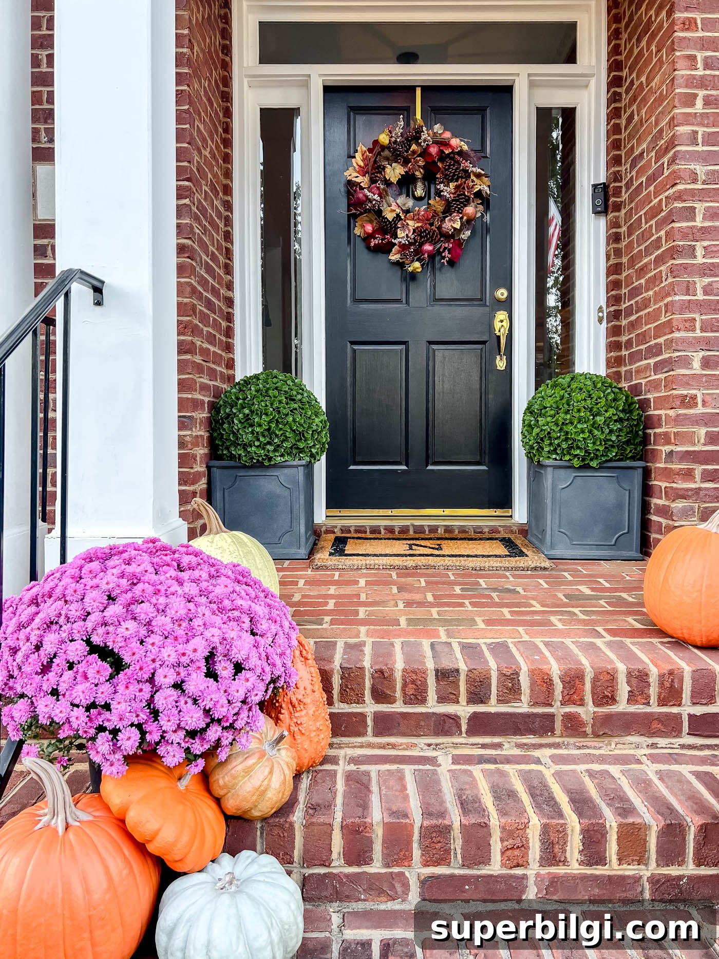 front porch with fake pumpkins that look real!