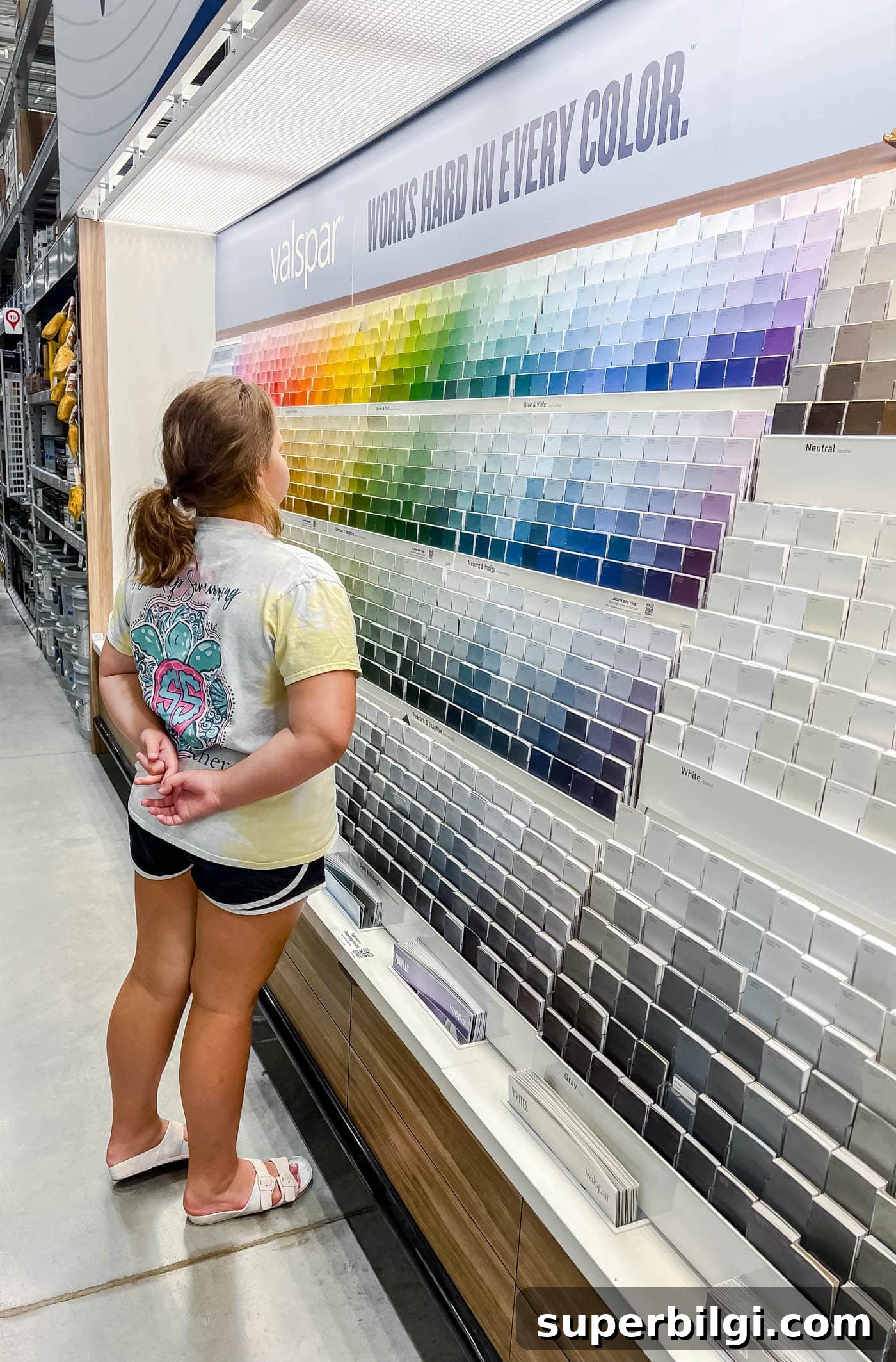 Transform Your Coastal Book Nook: Cozy Seaside Reading Corner 4 picking out paint colors at Lowe's.