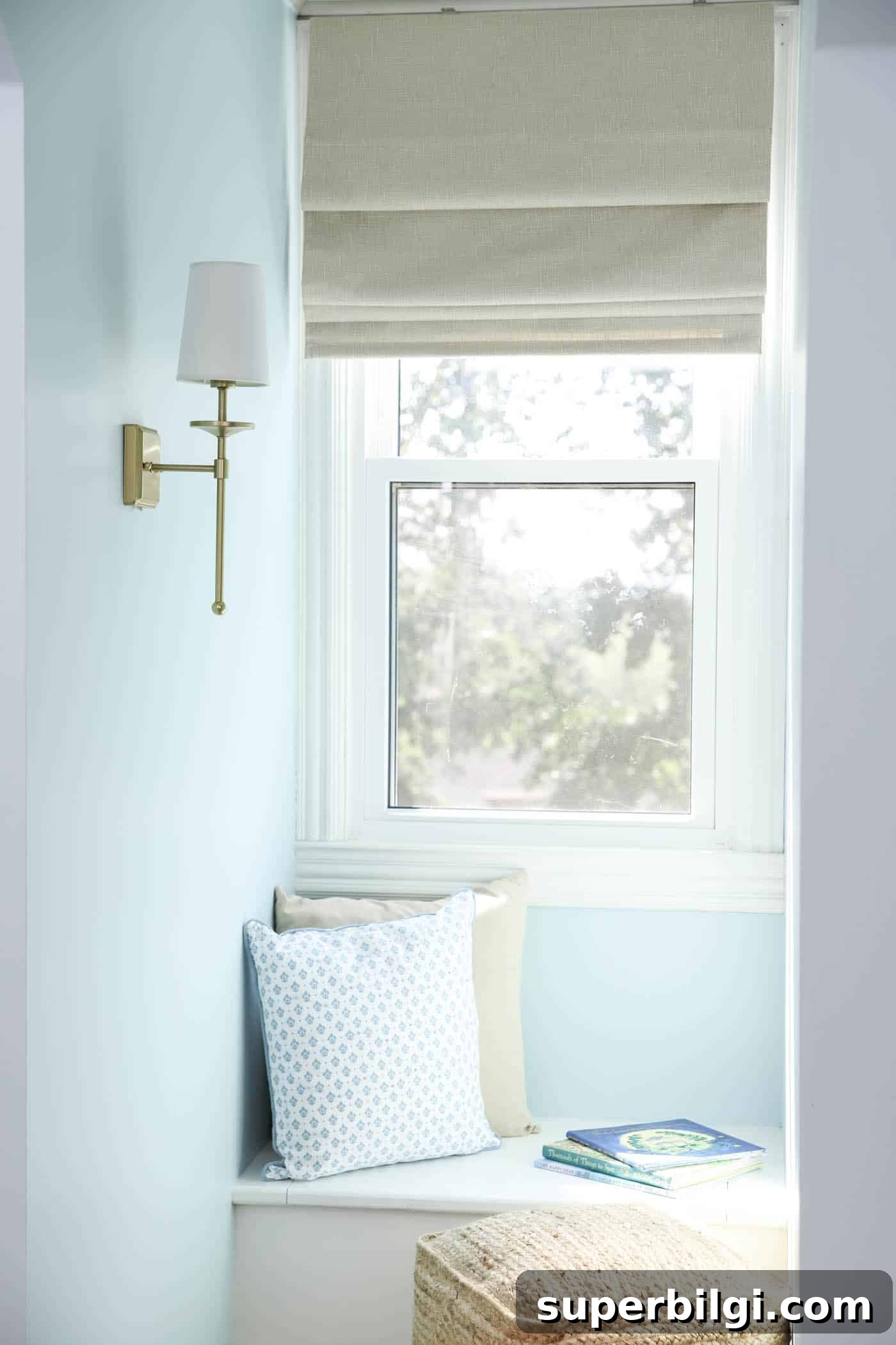 Transform Your Coastal Book Nook: Cozy Seaside Reading Corner 7 neutral window treatment roman shade for bedroom.