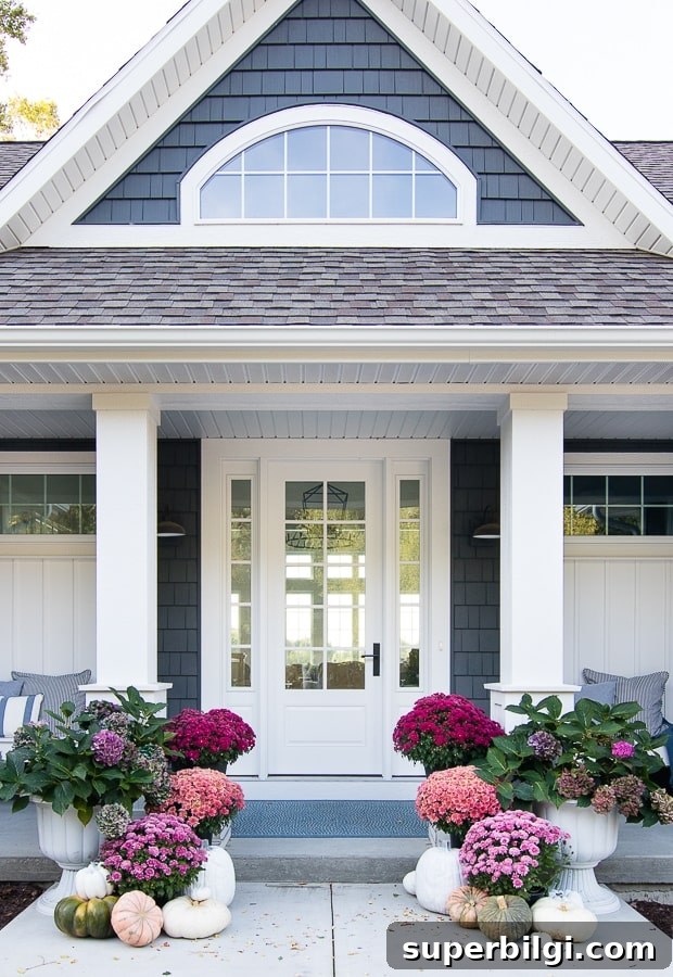 7 Creative Outdoor Fall Decorating Ideas 6 modern lake home with jewel tone pumpkins and neutral pumpkins.