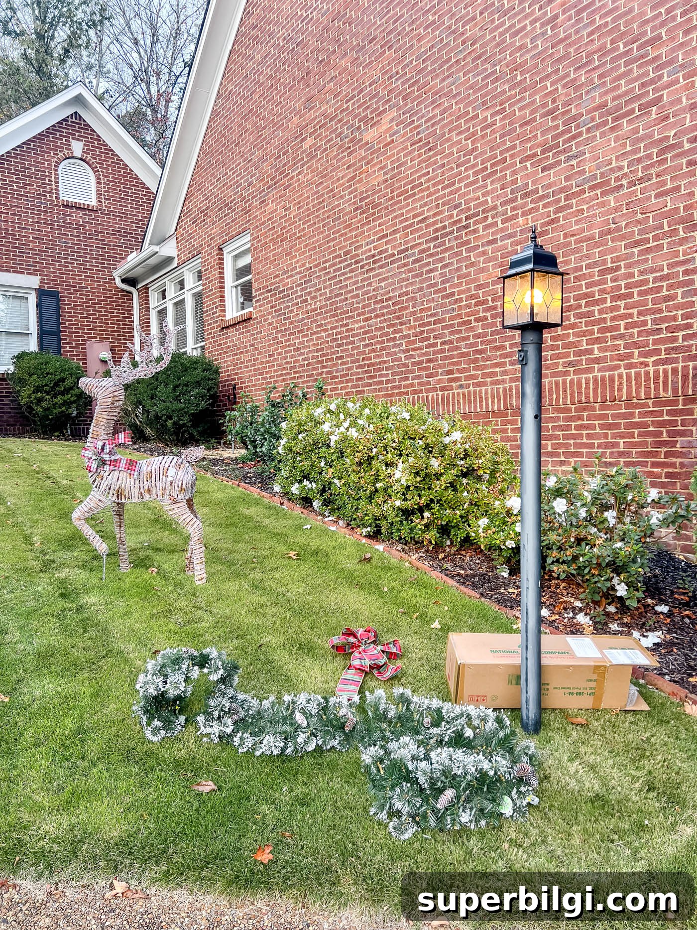 Outdoor Holiday Decor Deals: Lights, Wreaths and Lawn Displays 10 garland for the lamppost