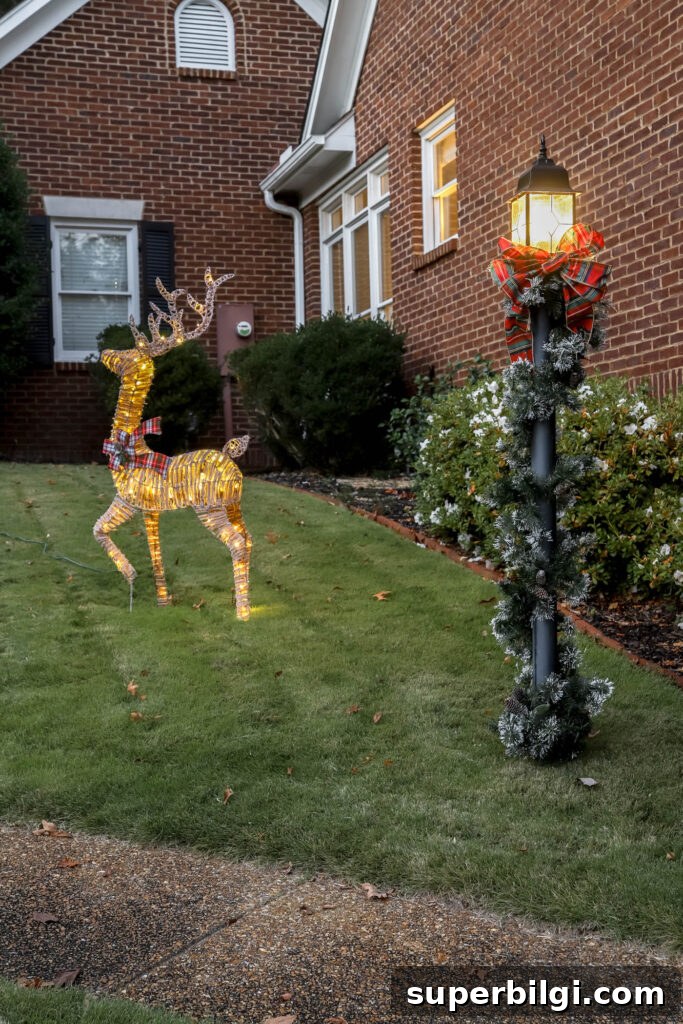 Outdoor Holiday Decor Deals: Lights, Wreaths and Lawn Displays 12 pre-lit buck holiday decor and decorated lamppost.
