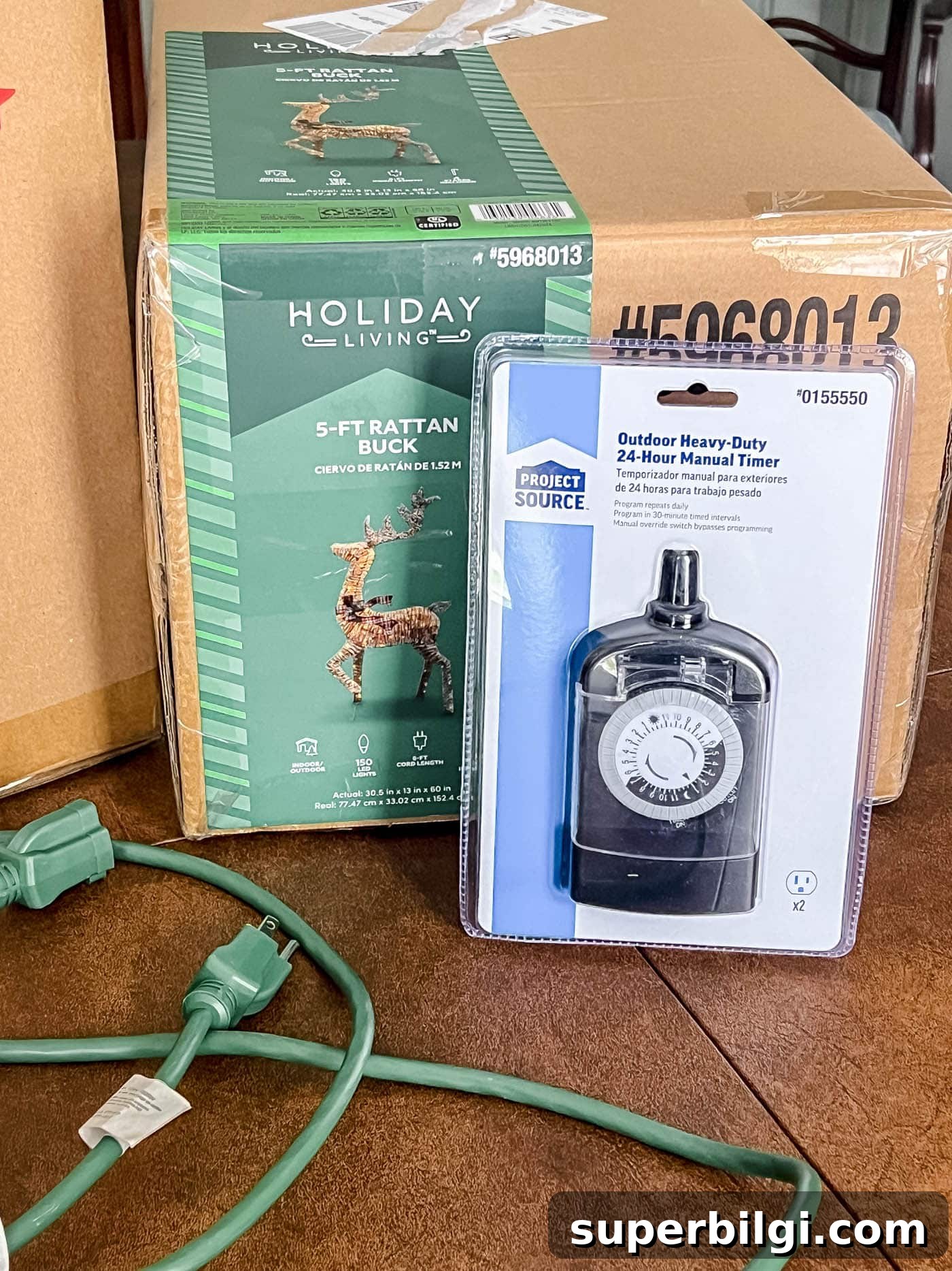 Outdoor Holiday Decor Deals: Lights, Wreaths and Lawn Displays 3 light up rattan buck deer with a outdoor rated timer and extension cord.