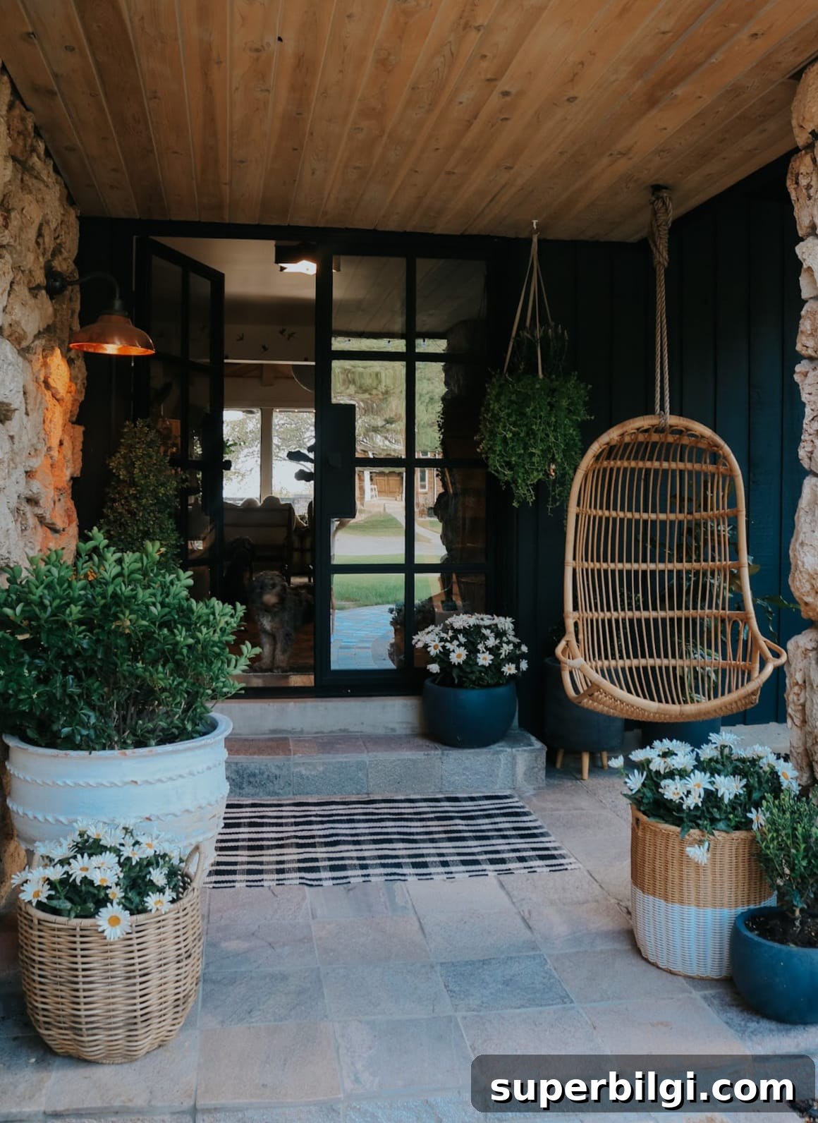 Small Porch Decorating Ideas to Maximize Style and Space 10 front porch with hanging plants and hanging chair.