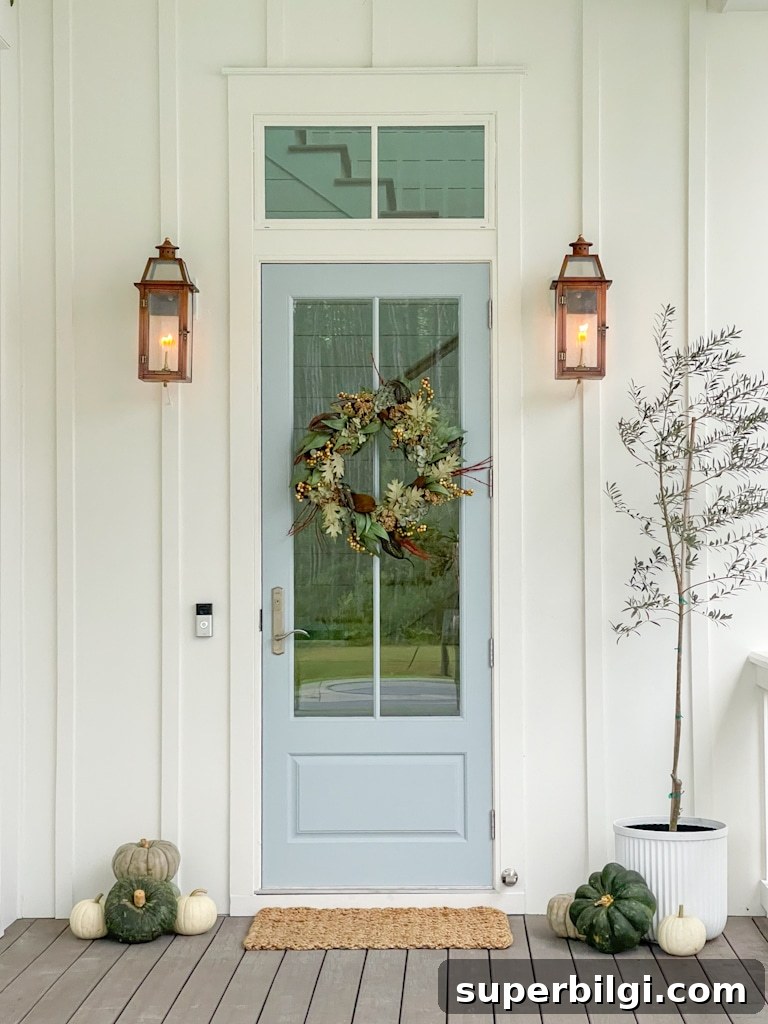 Small Porch Decorating Ideas to Maximize Style and Space 13 copper lanterns flank front door