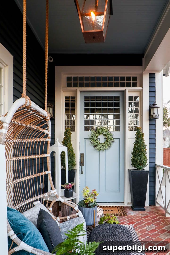 Small Porch Decorating Ideas to Maximize Style and Space 16 spring front porch with swing.