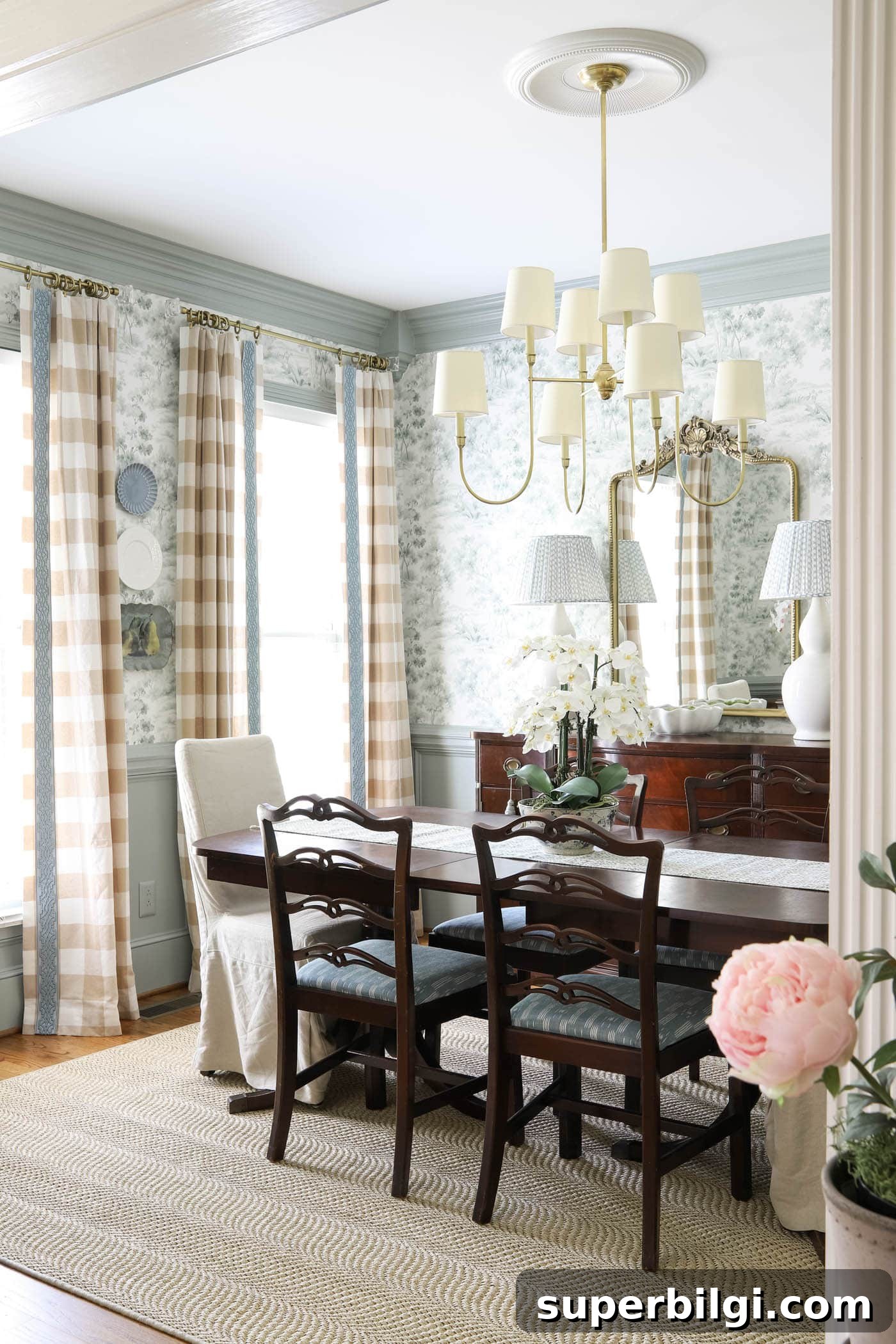 How to Hang Decorative Plates on a Wall Safely 11 plates on a wall between windows in a formal traditional dining room.