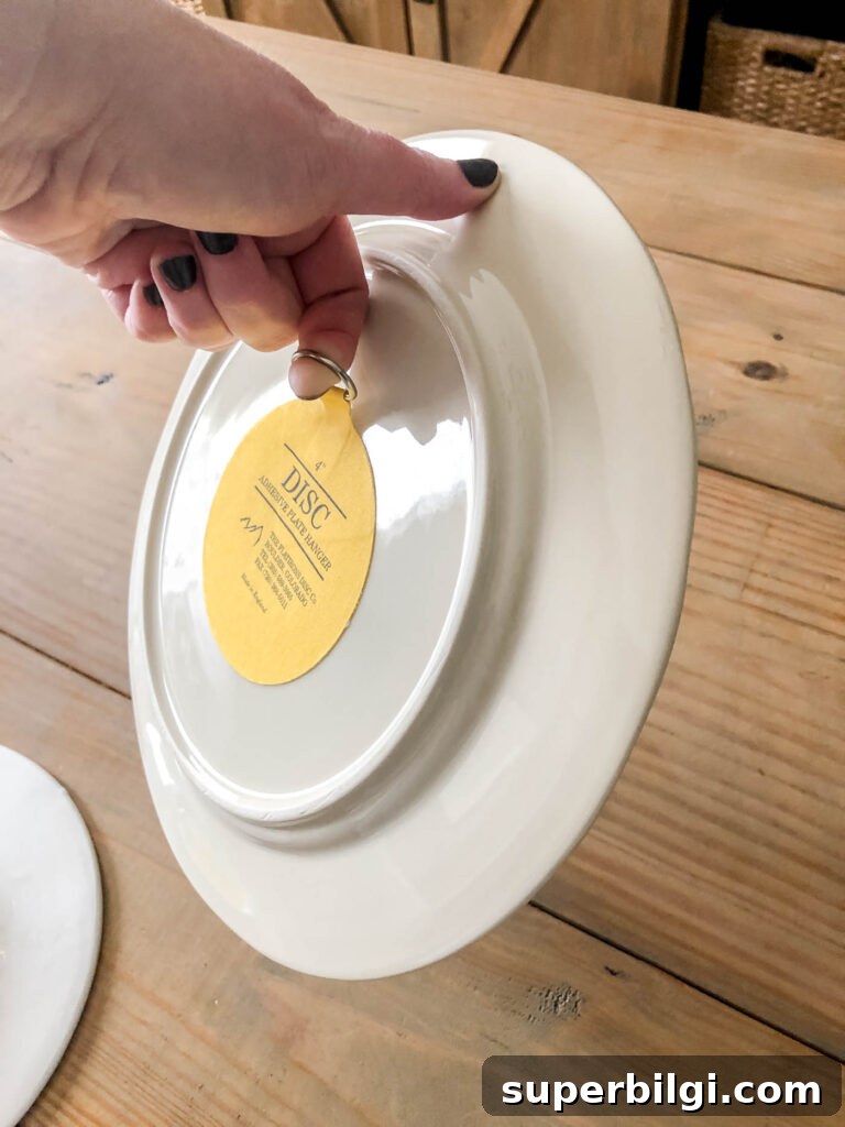 How to Hang Decorative Plates on a Wall Safely 8 leave the plate hanger for 24 hours and then test before hanging on the wall.