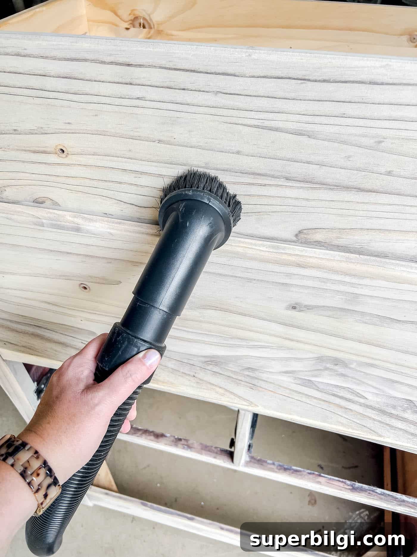 vacuum the furniture after sanding when you re-stain furniture.