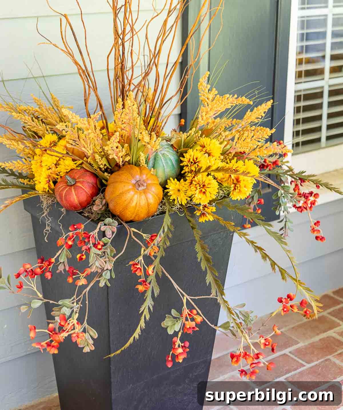 fall faux foliage in a planter
