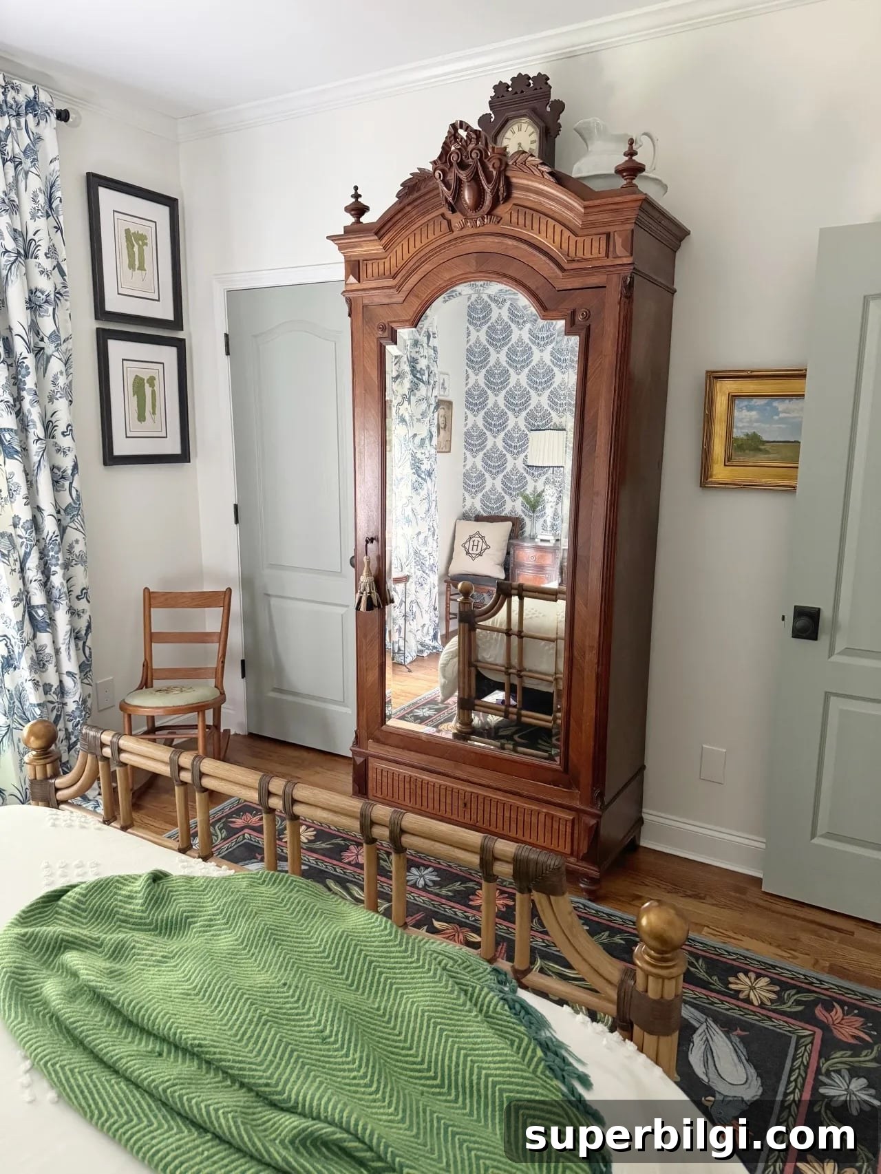 Fall Outdoor Ideas, Chinoiserie Office Reveal, Long-Lasting Mums 8 chinoiserie style brown armoire in a bedroom with light colored walls.
