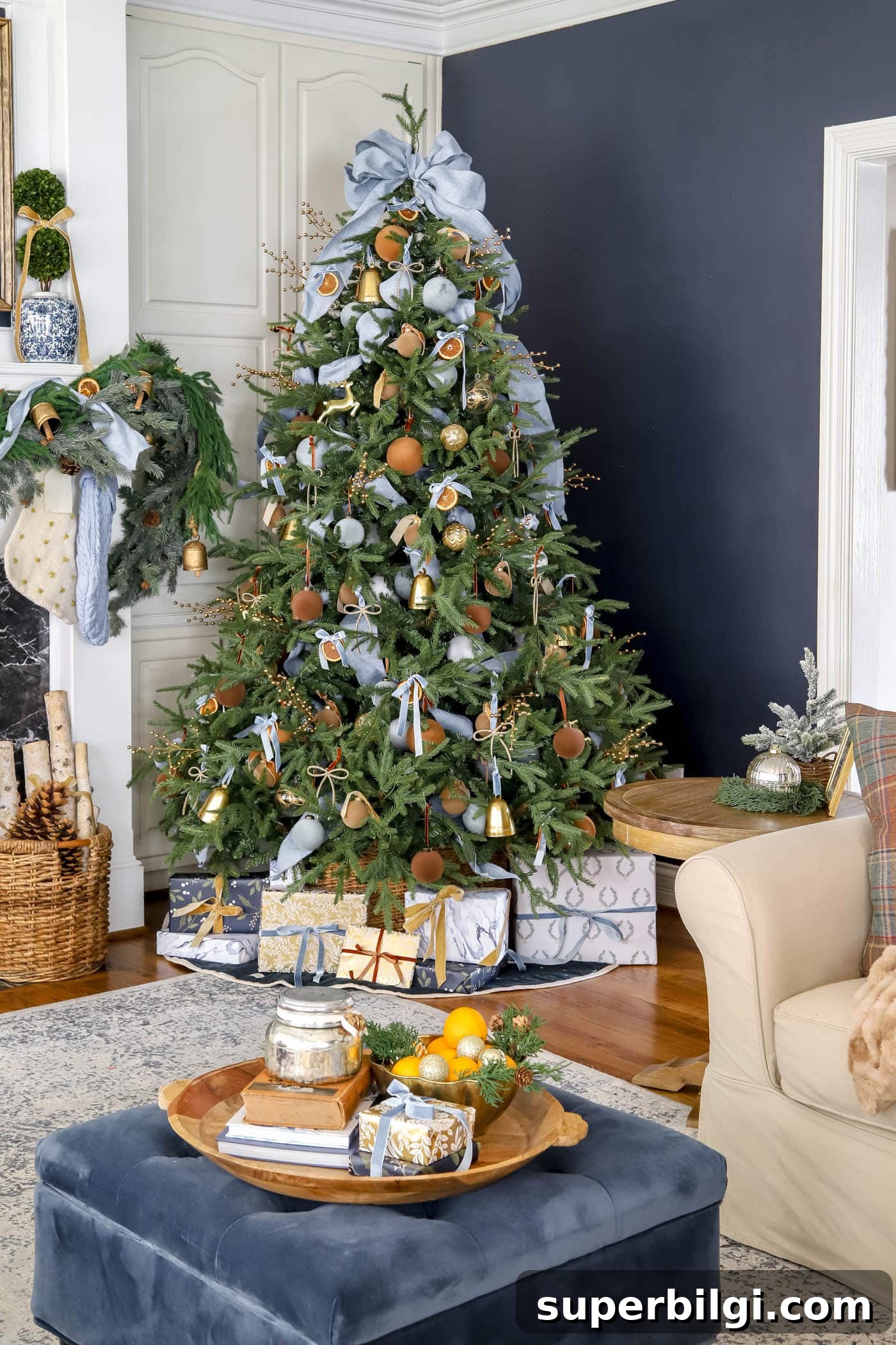 Christmas Decor Trends to Expect in 2025 2 gold, brown and blue Christmas tree decor.