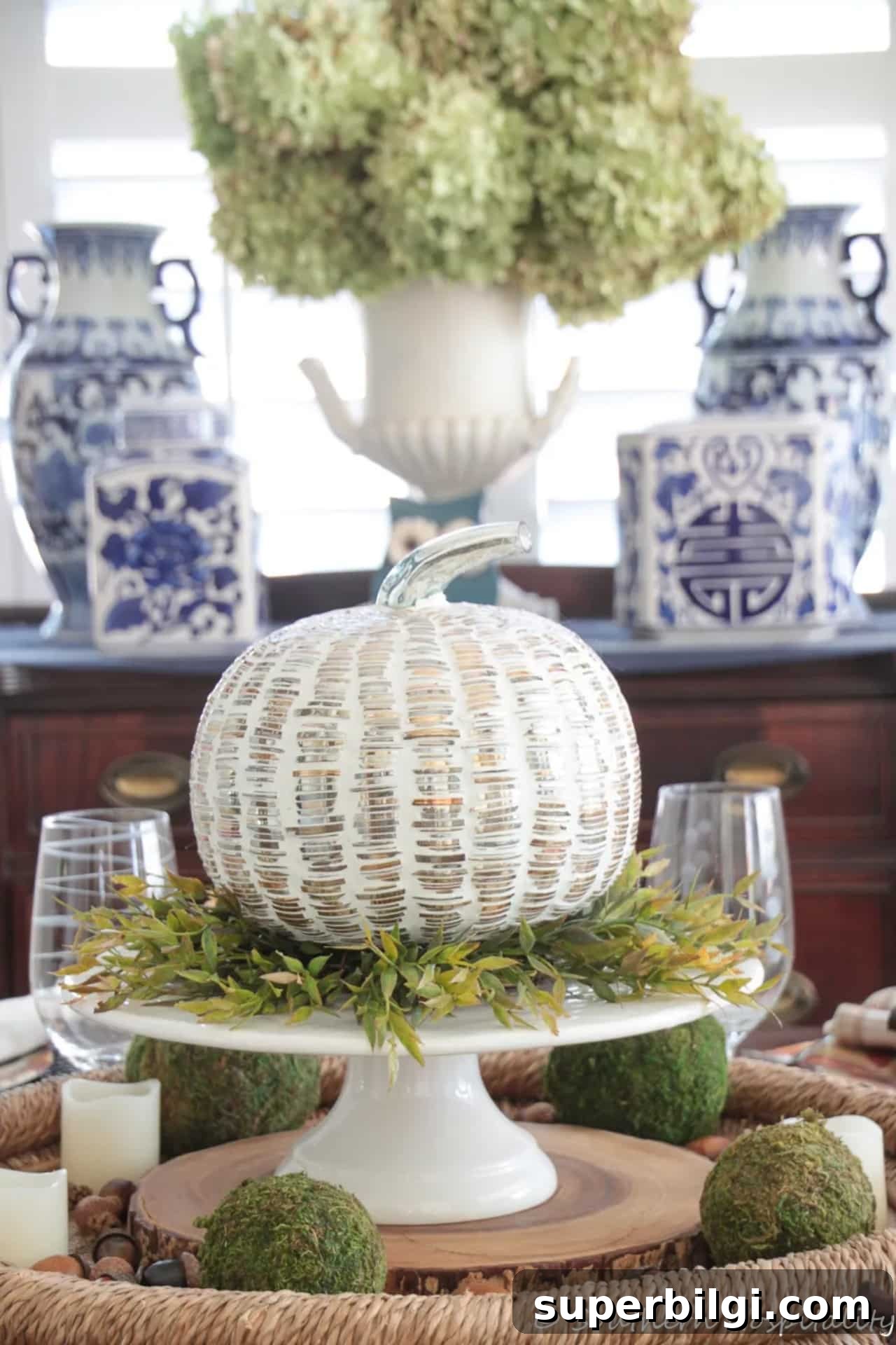 Holiday Kitchen: Christmas Ribbon Ideas and Red Plaid Tree 12 Thanksgiving table with pumpkin decor in the middle.