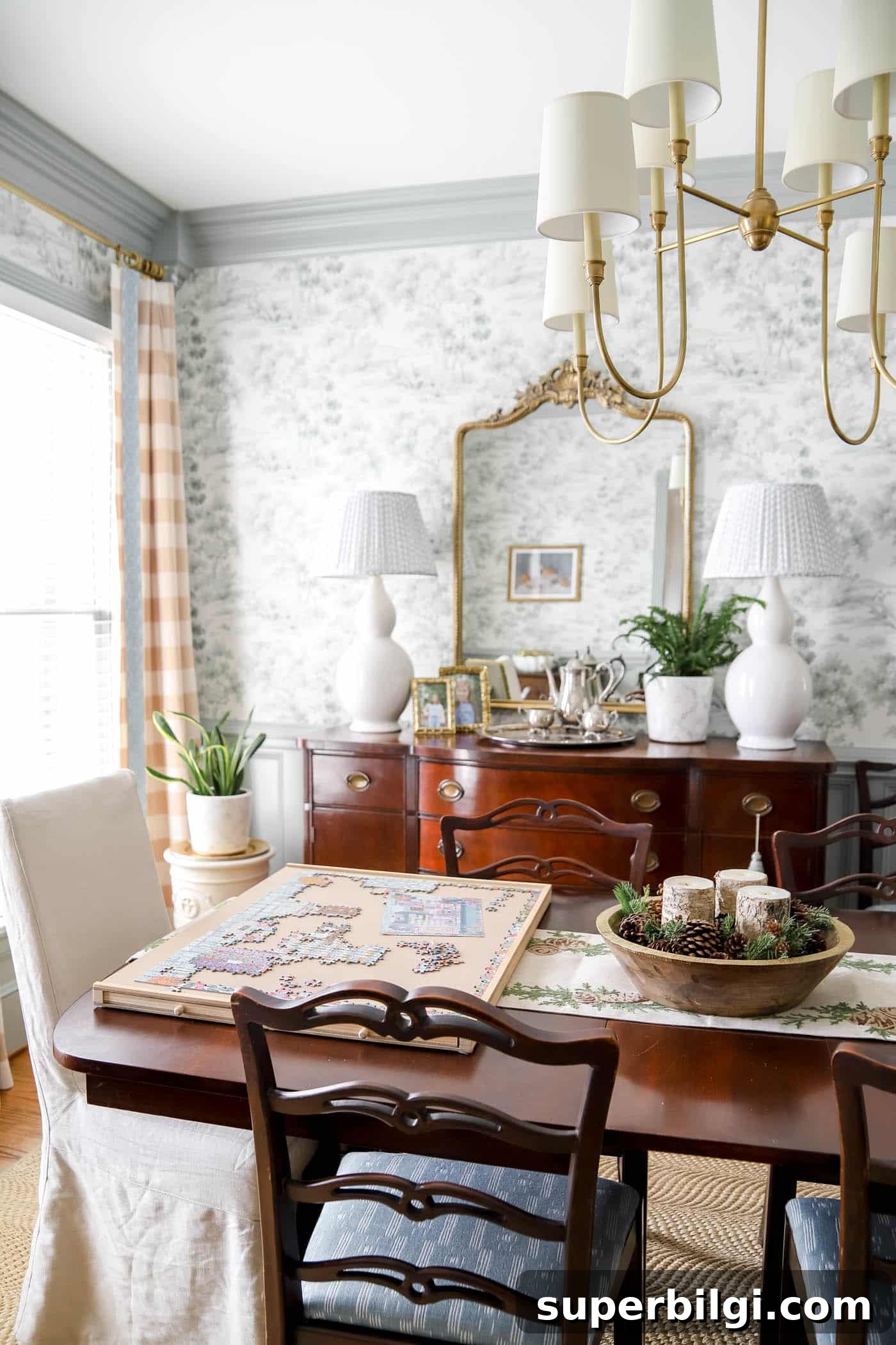 puzzle table in the dining room after Christmas winter decor.
