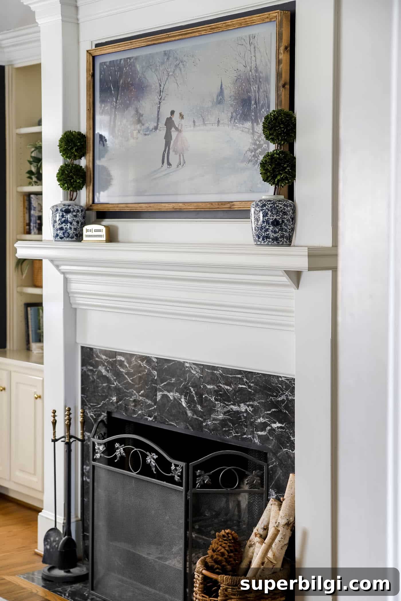 simple winter mantel with a Frame tv