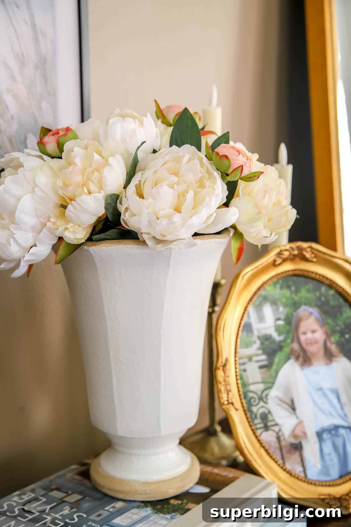 Spring Bedroom Decor Ideas to Instantly Refresh Your Space 7 faux peony bouquet with ranunculus in a ceramic vase.