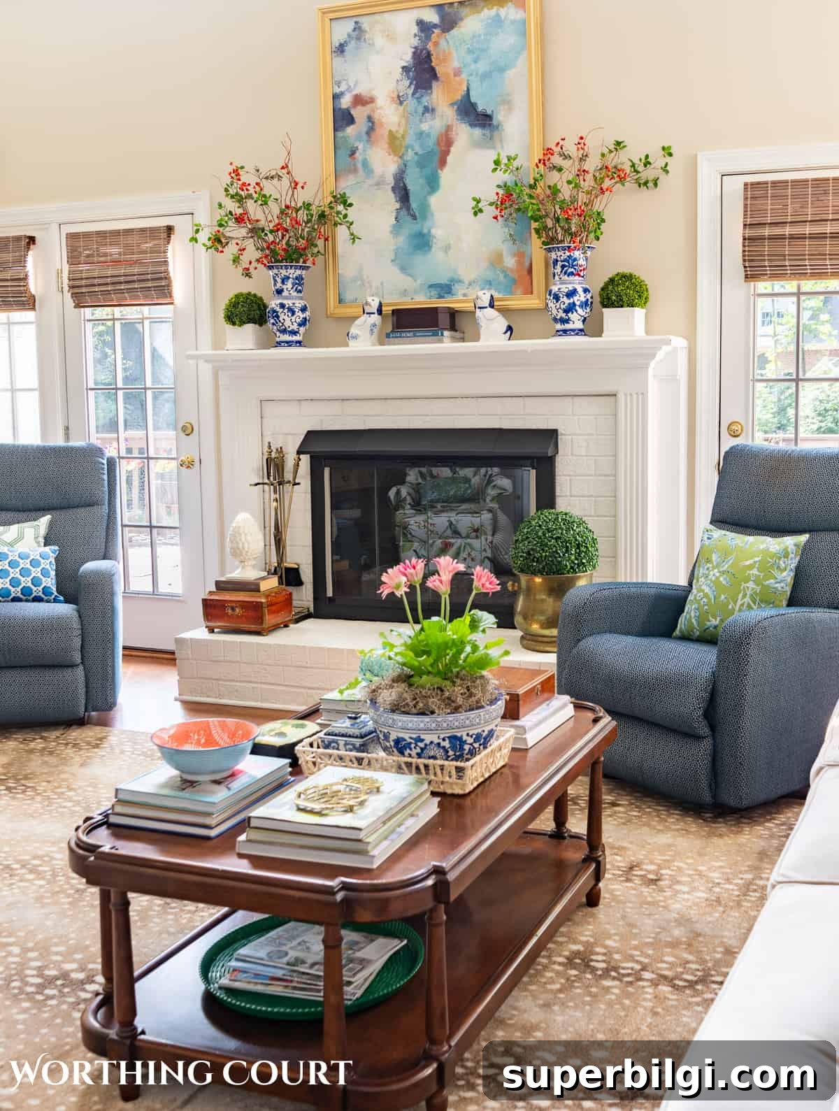 Small Porch Ideas, Pool Updates and Timeless Neutral Paint 12 Living room with beige walls, styled fireplace mantel, blue chairs and traditional decor ideas