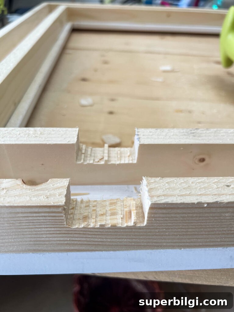 notched out board for the sensor for a Frame TV frame.