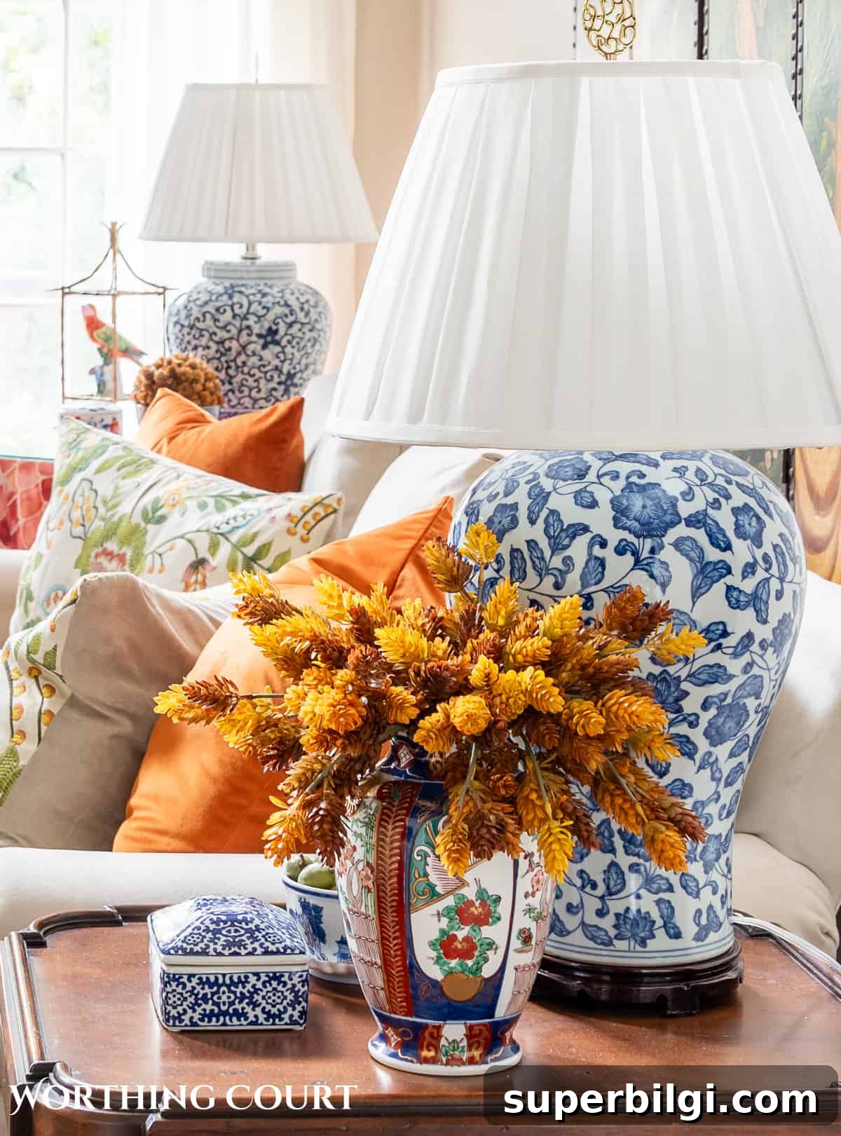 Get Your Home Ready for Fall: Decorating and Decluttering Tips 8 fall floral arrangement on an end table.